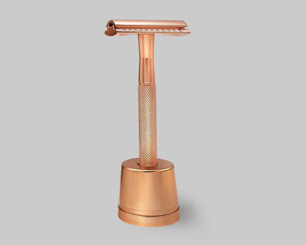rose gold razor with stand